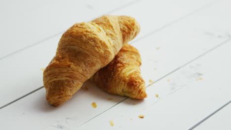 fresh croissants on table