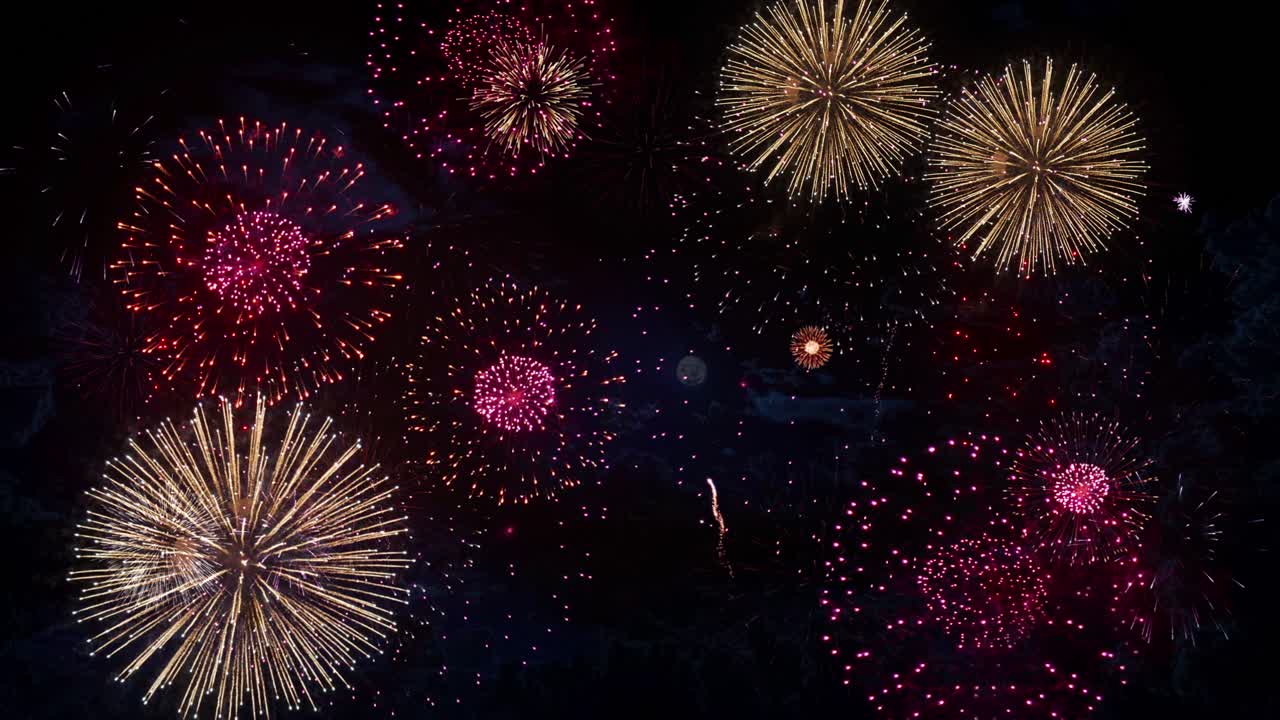 4k new years eve fireworks celebration real fireworks background abstract multicolor golden shining
