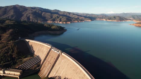 shasta dam, lake shasta and mount shasta in the distance