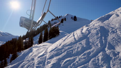 ski area in the swiss alps with people and chairlifts in the winter ski area of beckenried