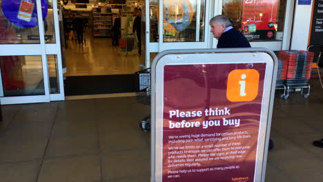 sign outside supermarket to deter panic buying