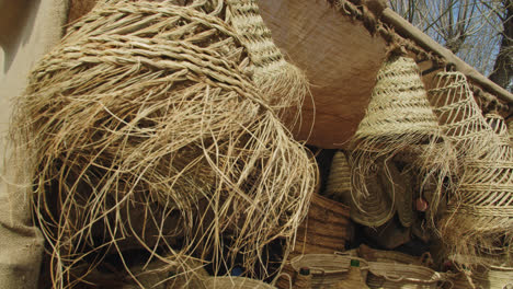 Amazing-slow-motion-shot-of-handicrafts-made-and-exhibited-in-a-stand-at-a-medieval-fair-in-Andalusia,-southern-Spain