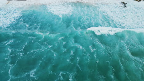 stunning aerial sea waves breaking on seashore. ocean surf rolling to beach.