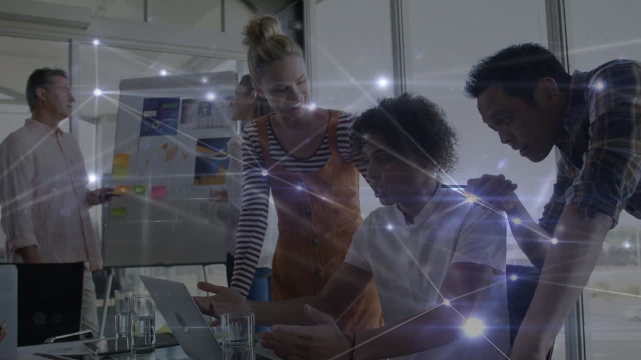 Animation of network of connections over diverse female and male coworkers in office