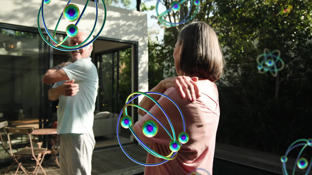 Sunlight starting senior couple stretching shoulders on deck AR spheres passing in front for health