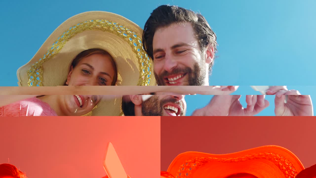 pareja usando el teléfono móvil en un día soleado