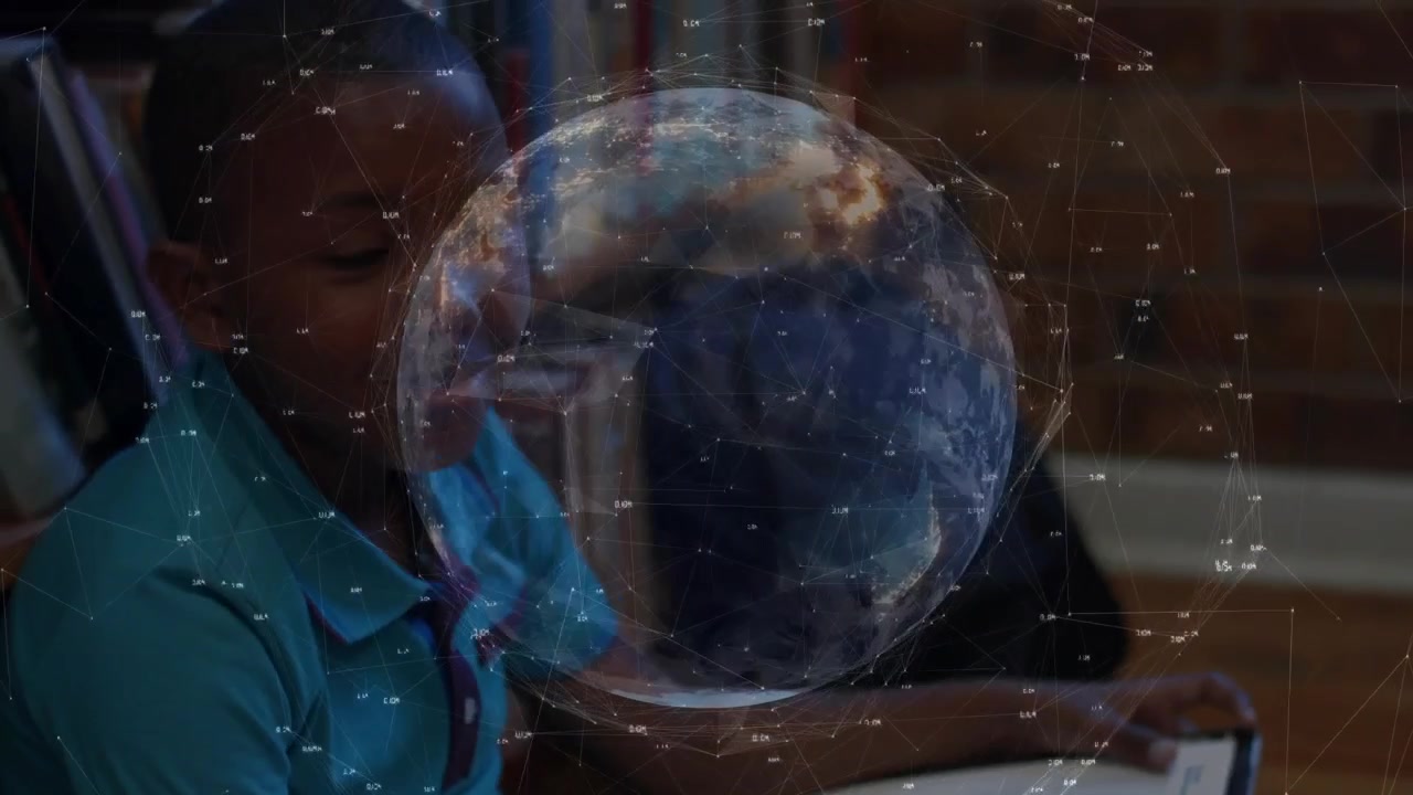 male child turning atlas pages and initiating rotating globe while exploring geography education