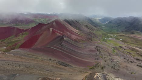 Aerial-fly-drone-view-of-Rainbow-Mountain-,-Vinicunca,-Cusco-Region,-Peru