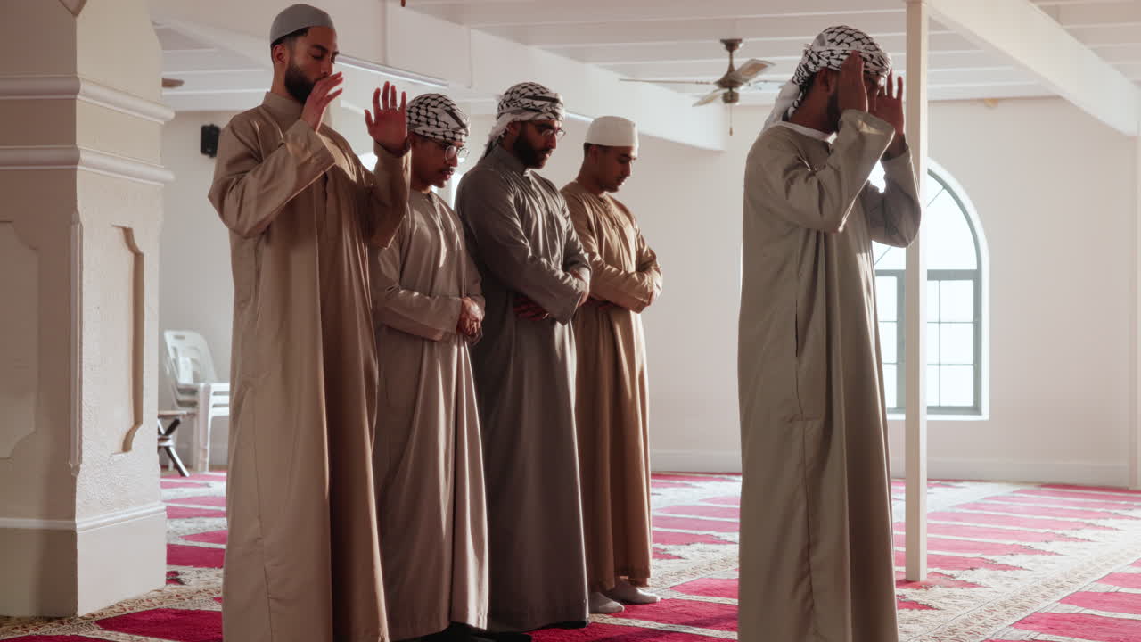 Muslim men praying in a mosque