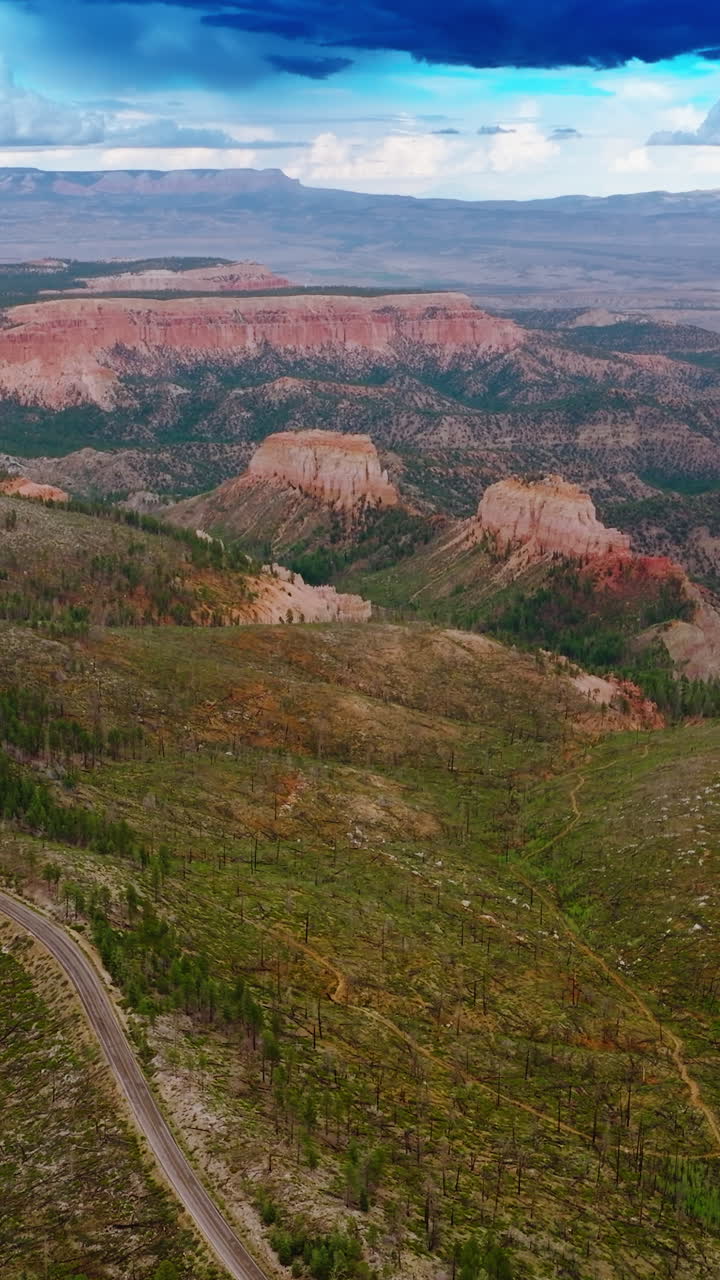 Azure cloudy skies over the mountainous landscape of Utah canyons. Beautiful rocks of Zion National park from top view. Vertical video