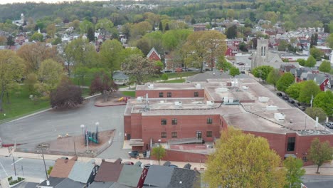 aerial of brick school building in large american city