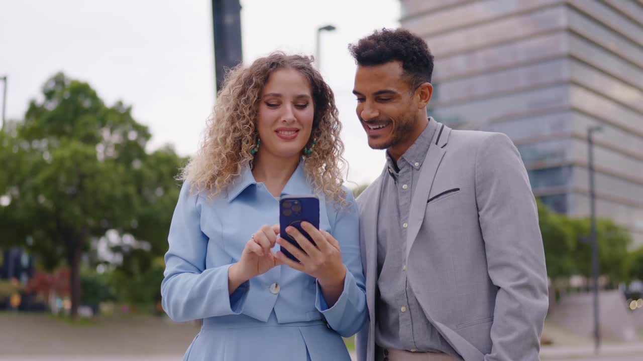 People looking at a phone