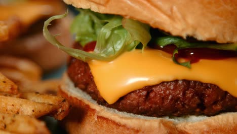 Close-Up-of-Cheese-Burger-and-French-Fries-Chips