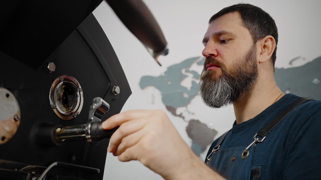 Coffee Roaster Inspecting Beans