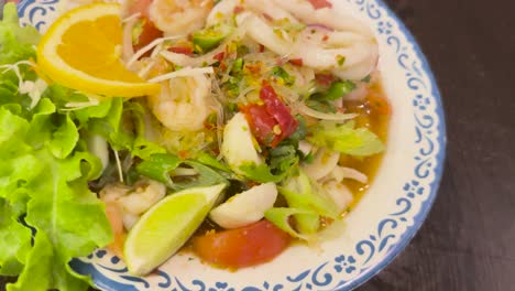 colorful thai salad with fresh ingredients displayed