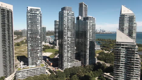 glass and concrete skyscrapers of toronto filmed from the air