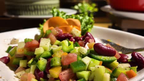 close-up of a vibrant mixed vegetable and bean salad