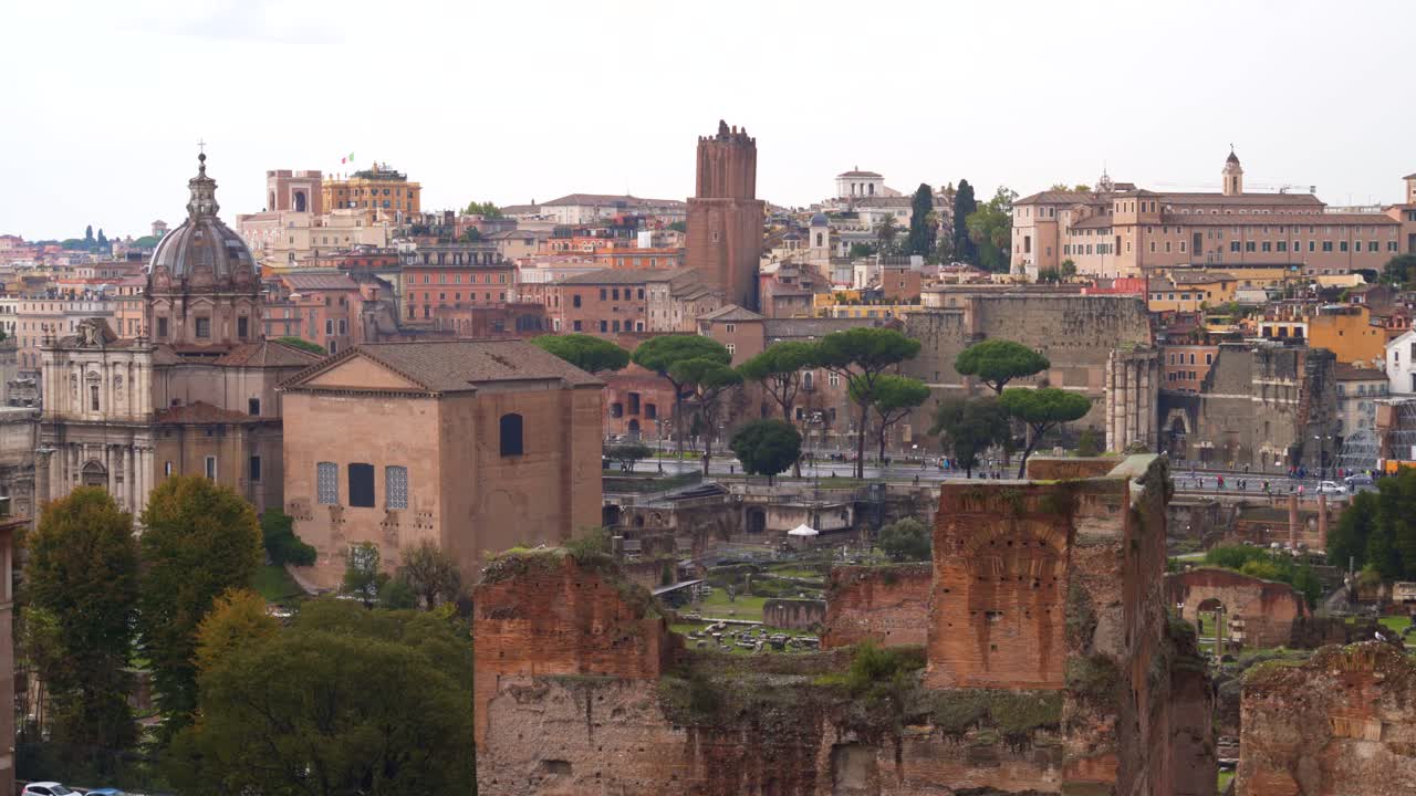Downtown cityscape view of buildings, pedestrians and old ruin attraction in Rome, Italy, handheld static