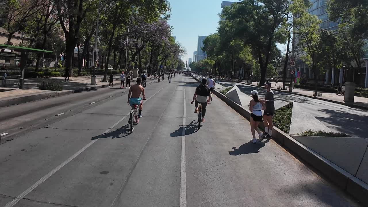 Shot of several bikers in mexico city bike ride at Sunday