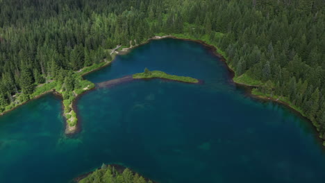 scenic lake and mountain valley aerial orbit drone shots