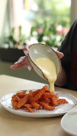 sweet potato fries with cheese sauce