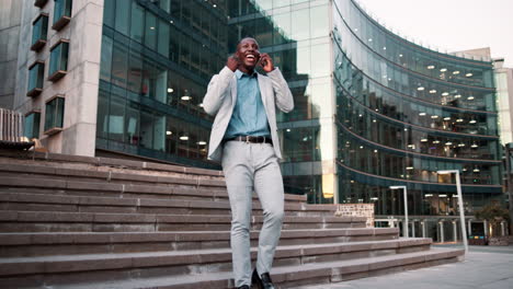 happy businessman on a phone call