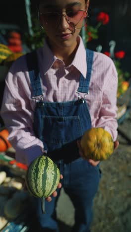 woman holding gourds