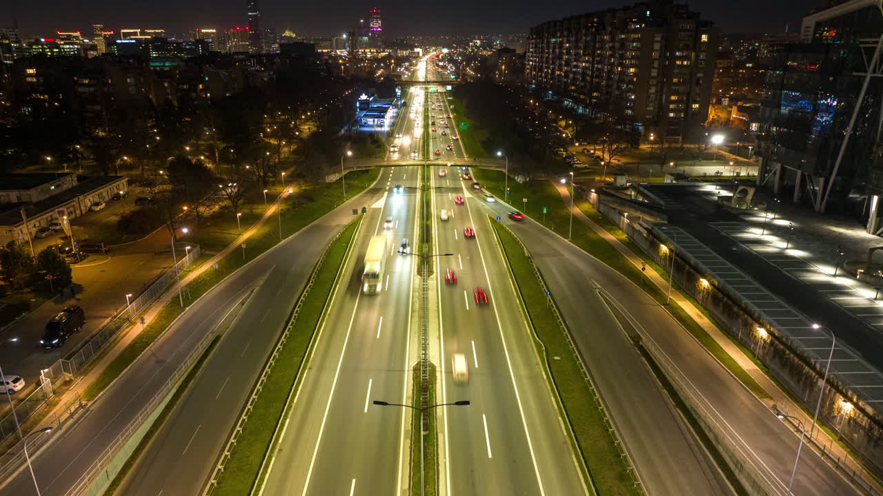 Nighttime City Highway with Blurry Car Light Trails