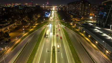 nighttime city highway with blurry car light trails