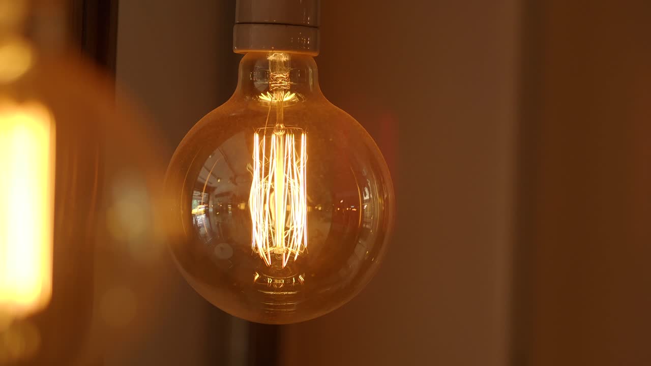A close-up of a glowing light bulb