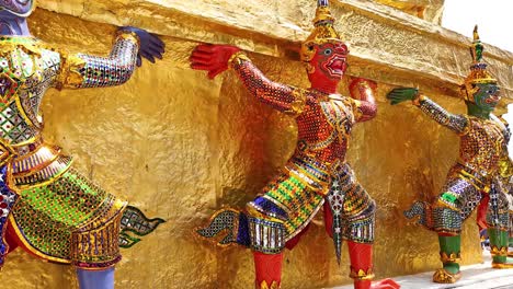 colorful statues at bangkok's iconic temple