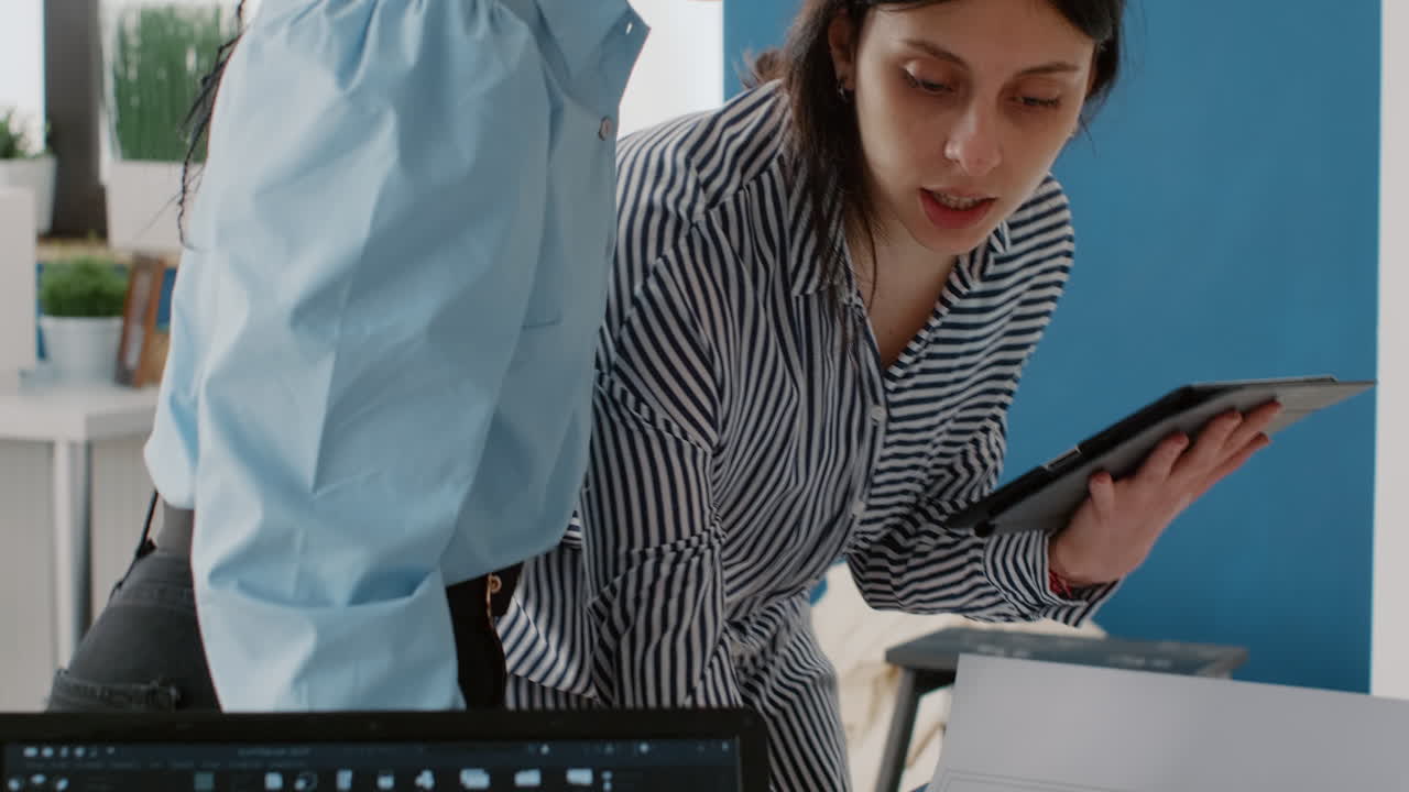 Two women working in the office