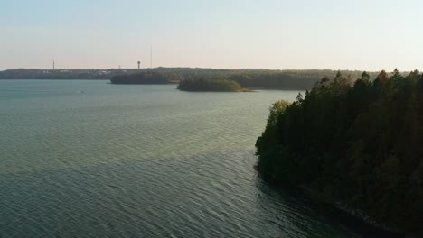 Drone-shot-of-rocky-Baltic-sea-coast-in-Sweden-during-sunset