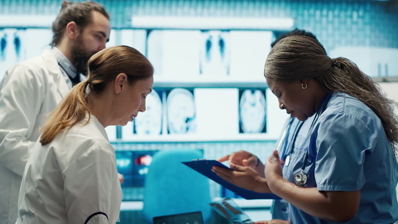 Medical Professionals Discussing X-Ray Results