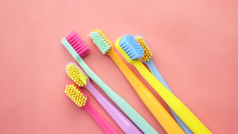 Ful-toothbrushes-on-a-pick-background