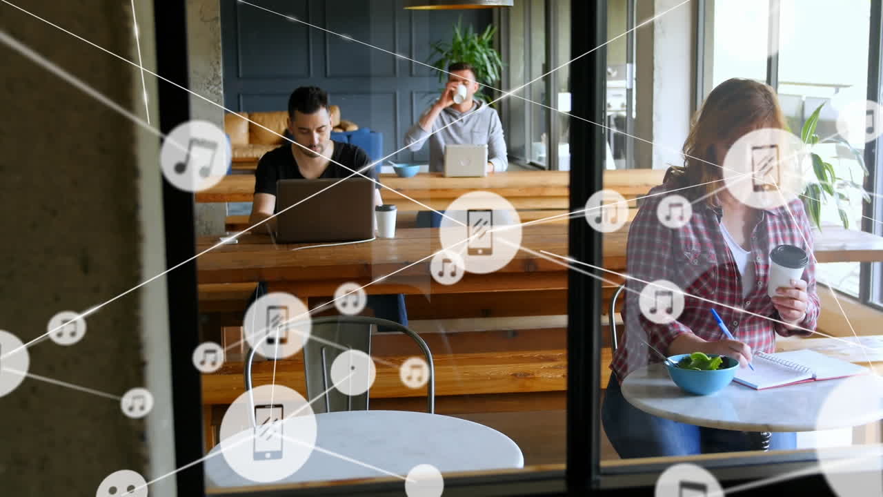 사무실의 카페에서 일하는 다양한 사람들을 상대로 디지털 아이콘 네트워크의 애니메이션