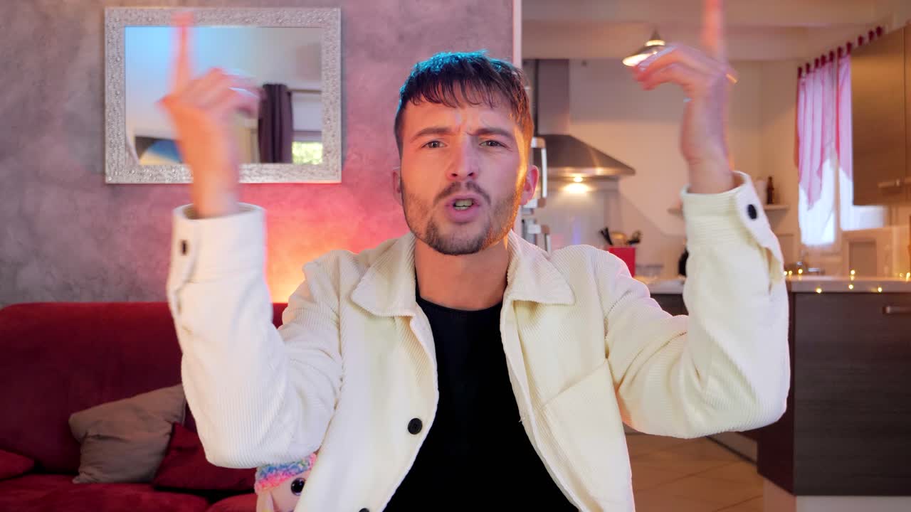 dolly shot of a musician performing whilst sitting at a poker table for a video