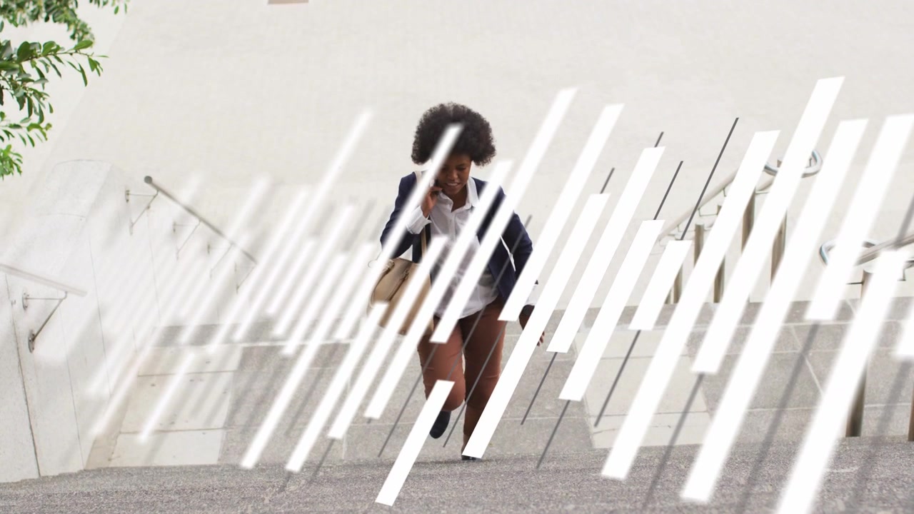 Businesswoman climbing stairs taking call hurrying to meeting diagonal white overlay obscuring