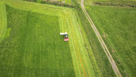 aerial view of tractor mowing a field