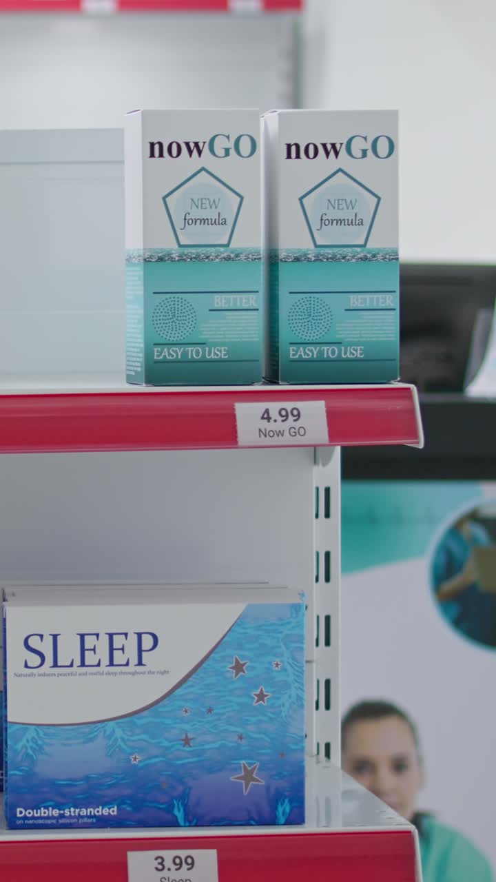 Vertical Video Empty drugstore shelves filled with medical supplies and pills