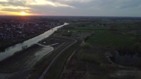 Beautiful-Sunset-Over-Bergenmeersen,-Uitbergen,-Belgium,-Aerial-Dolly-Out