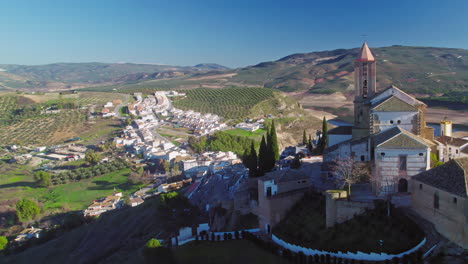 aerial panoramic view of iznájar and it's surrounding area, moving backwards