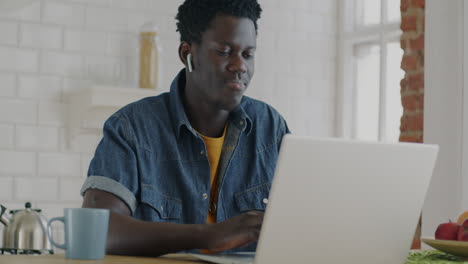 man working from home on laptop