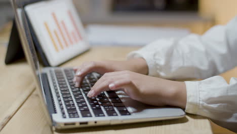 Closeup-shot-of-schoolchild-typing-on-laptop