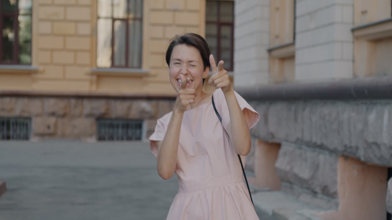 Smiling Woman in a Pink Dress