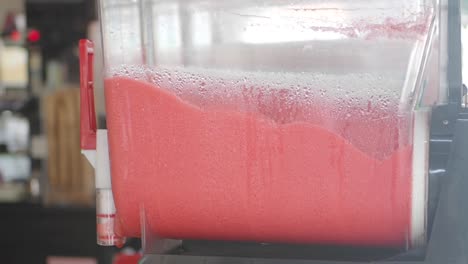 red slushie in a machine