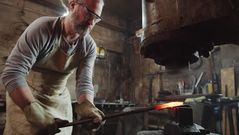 Blacksmith-Working-with-Pneumatic-Power-Hammer