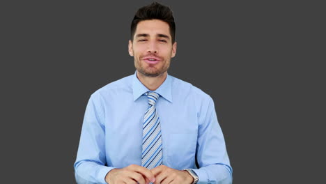 young businessman talking to camera