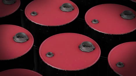 Video-of-multiple-red-barrels-on-black-background