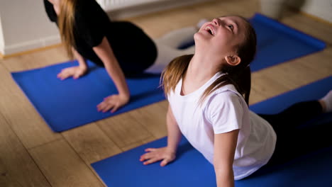 kids practising yoga